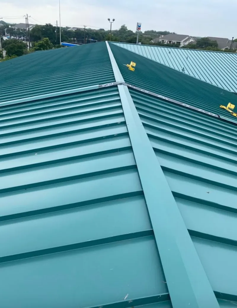 Green commercial metal roof ridge and valley for Metal Roof Repair in Rantoul