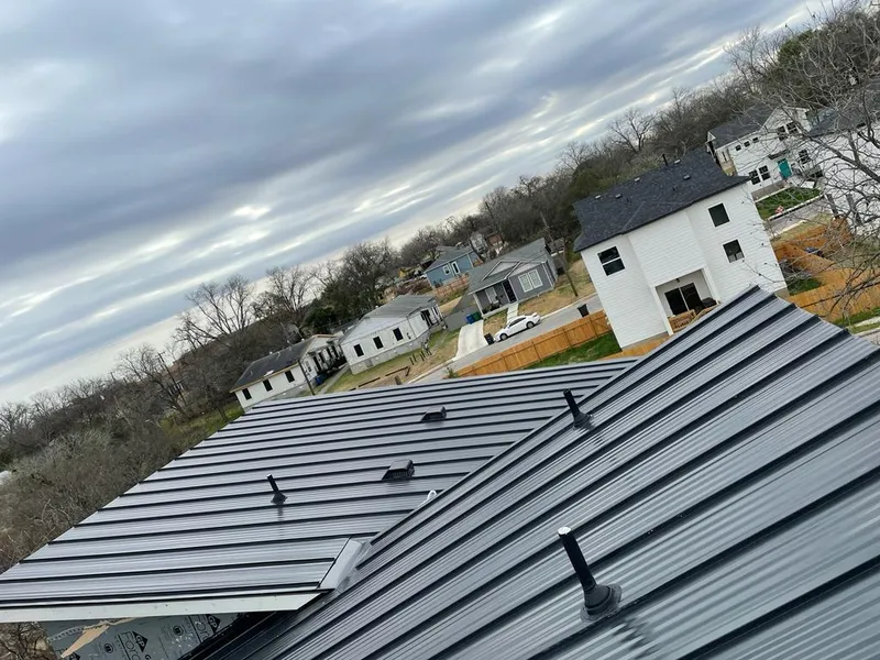 Standing seam metal roof panels with vents for Skylight Repair in Rantoul